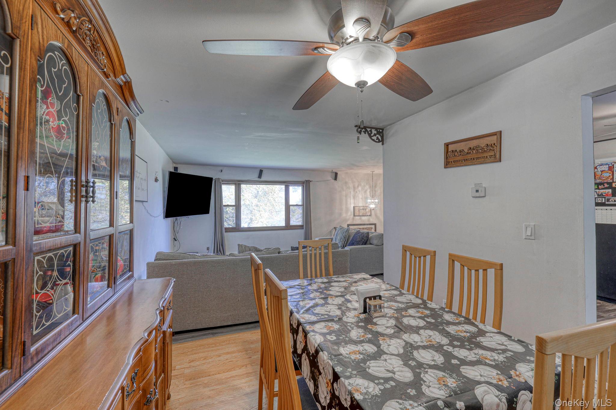 191 Mills Road Walden, NY 12586 - Photo 11 of 27 Dining room with light wood-style flooring and a ceiling fan