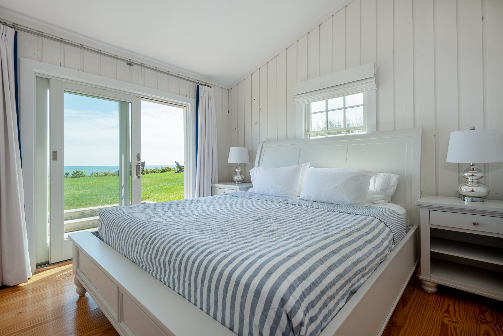 1 Reeds Way Nantucket, MA 02554 - Photo 48 of 51 a bedroom with a bed and a large window