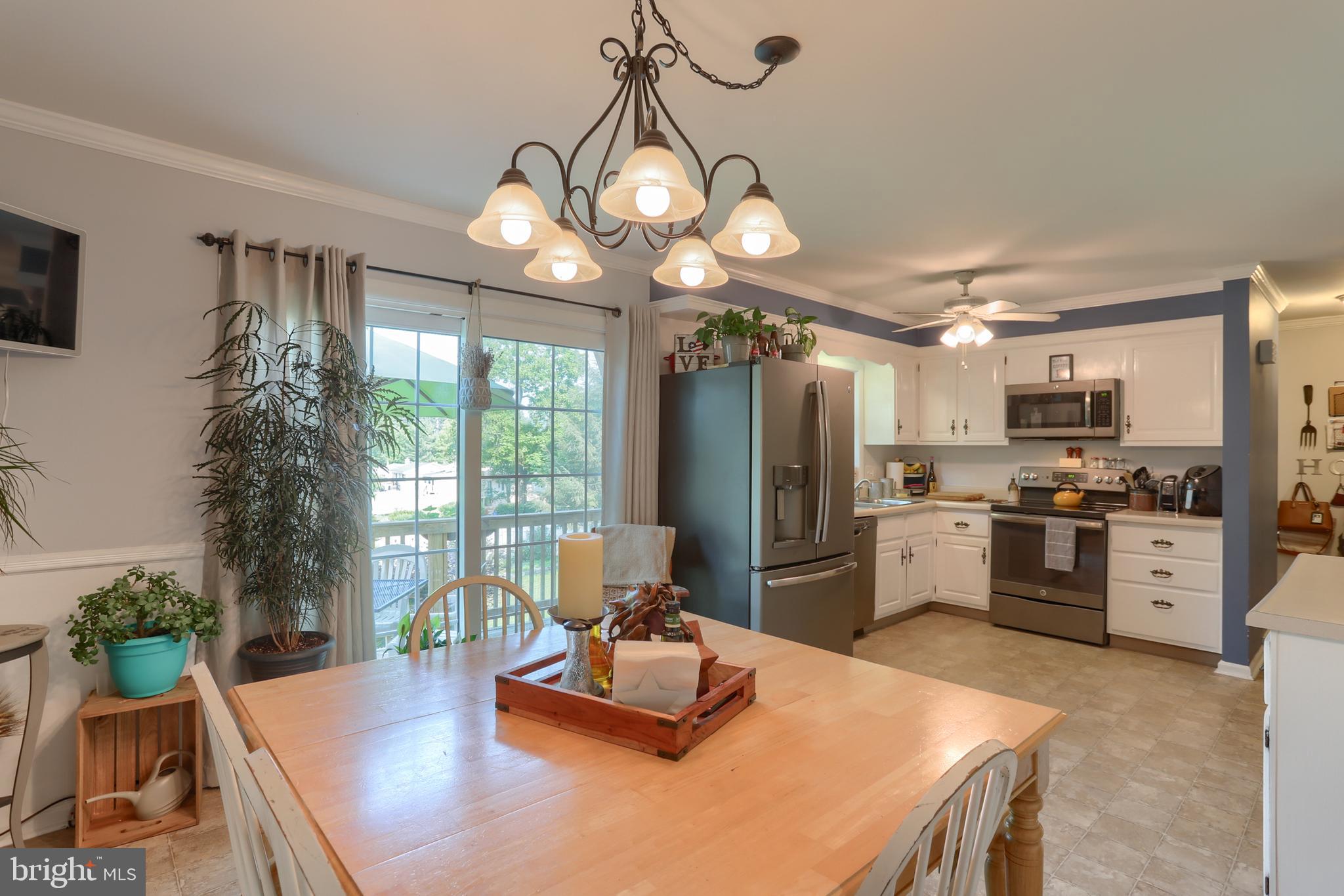 406 Calyn Drive Reading, PA 19607 - Photo 7 of 40 Kitchen/Dining Area with access to outdoor deck