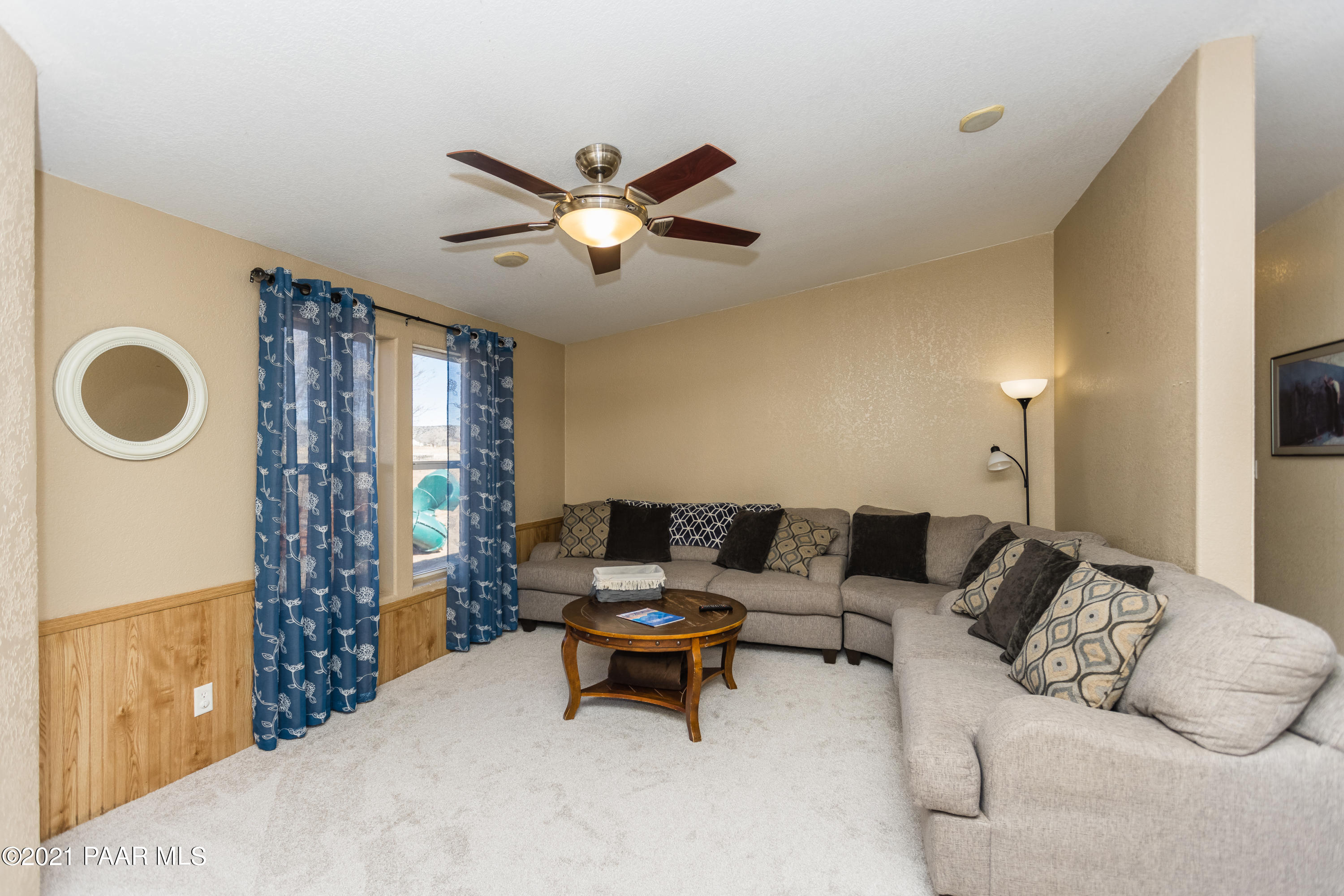 25355 North Mitchell Road Paulden, AZ 86334 - Photo 11 of 37 a living room with furniture and a large window