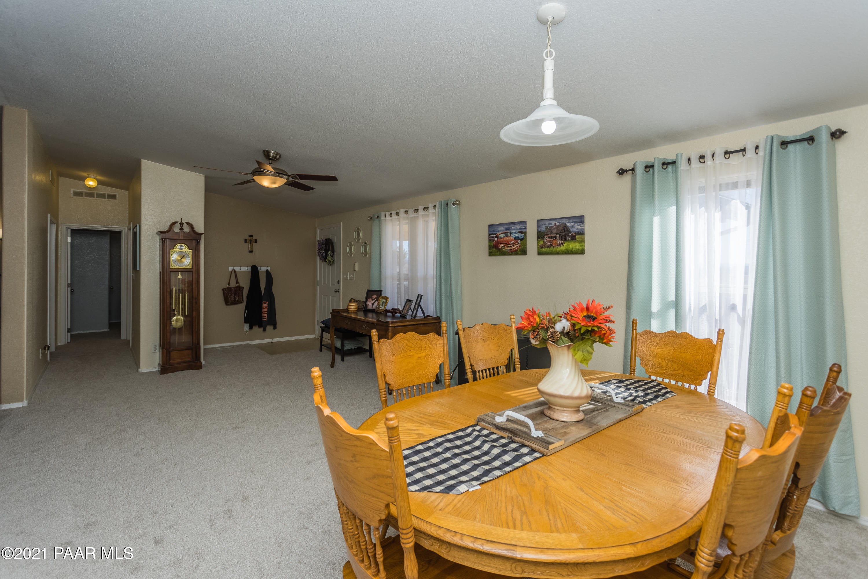 25355 North Mitchell Road Paulden, AZ 86334 - Photo 14 of 37 a living room with furniture and a table