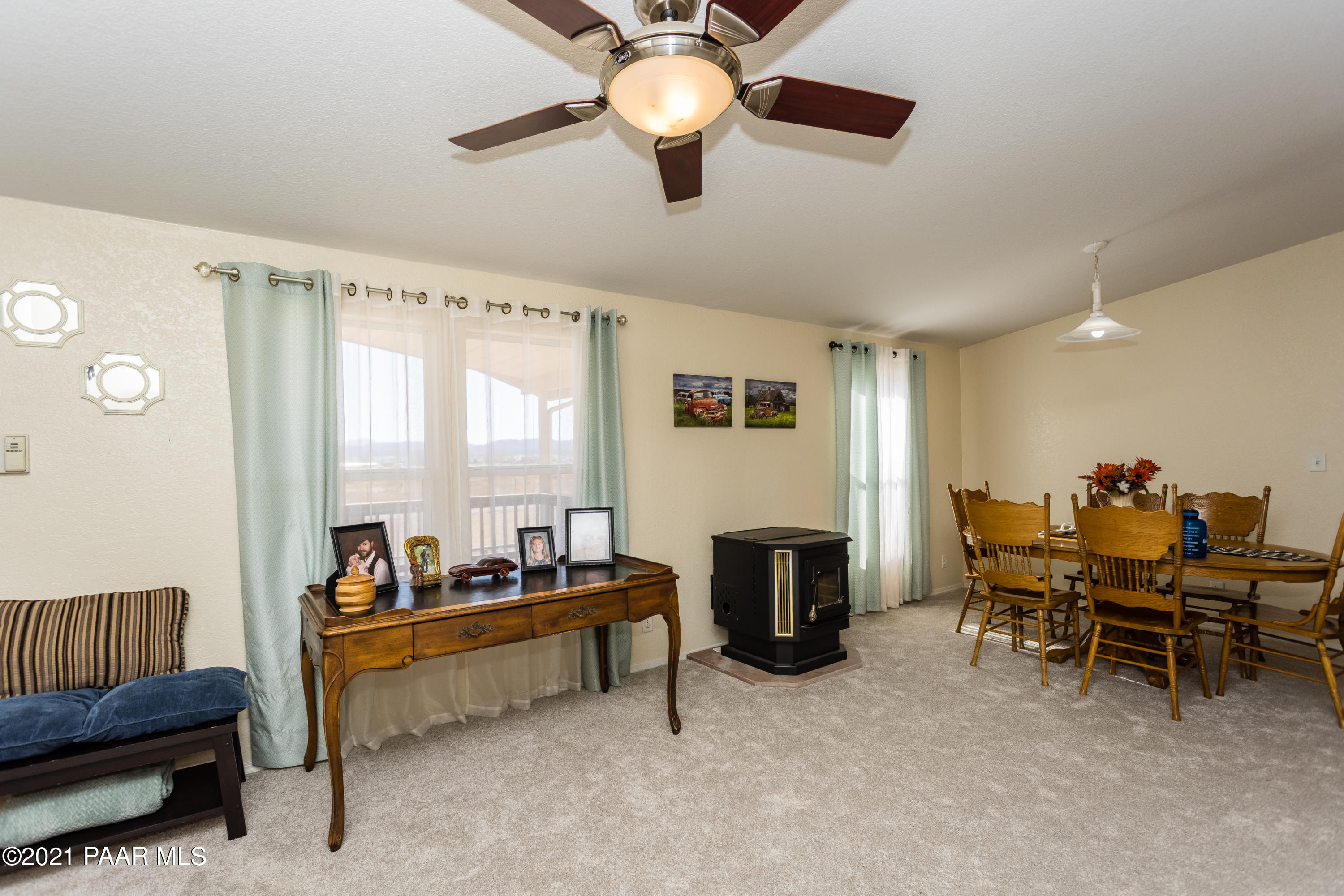 25355 North Mitchell Road Paulden, AZ 86334 - Photo 10 of 37 a living room with furniture and a fireplace