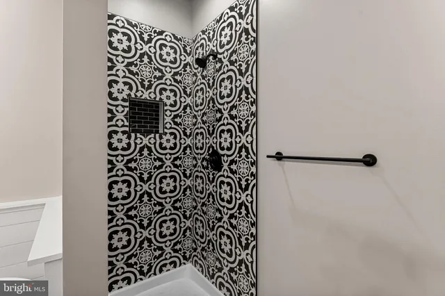 a bathroom with a shower curtain