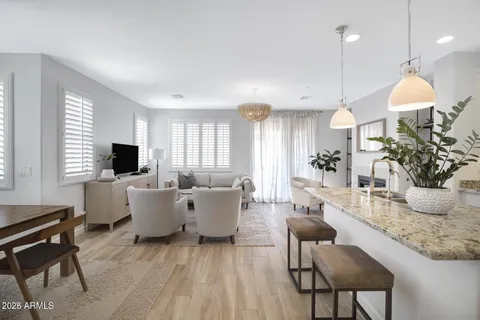 a living room with fireplace furniture and a flat screen tv