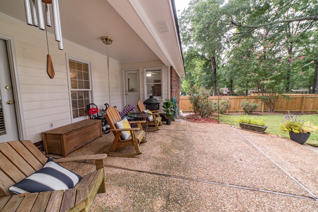 9 Conisburgh Court Columbus, GA 31907 - Photo 11 of 46 a view of a patio with couches table and chairs and potted plants