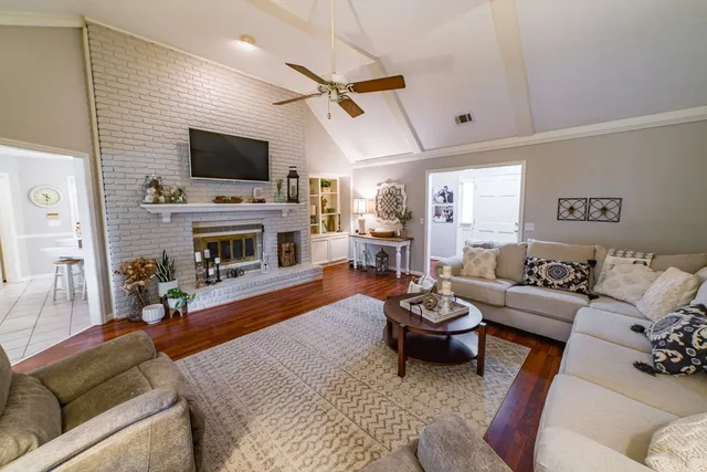 a dining room with furniture and window