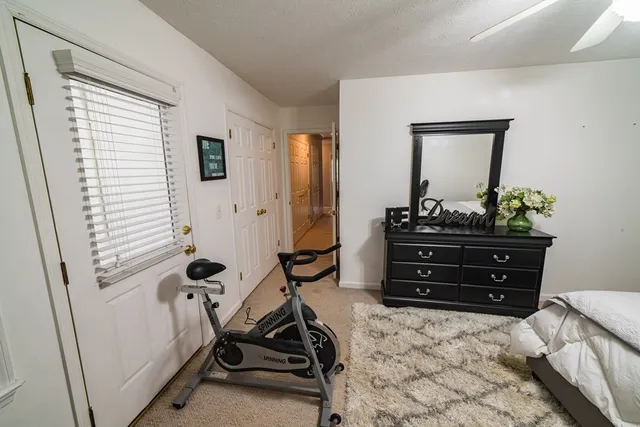 a view of a livingroom with furniture and window