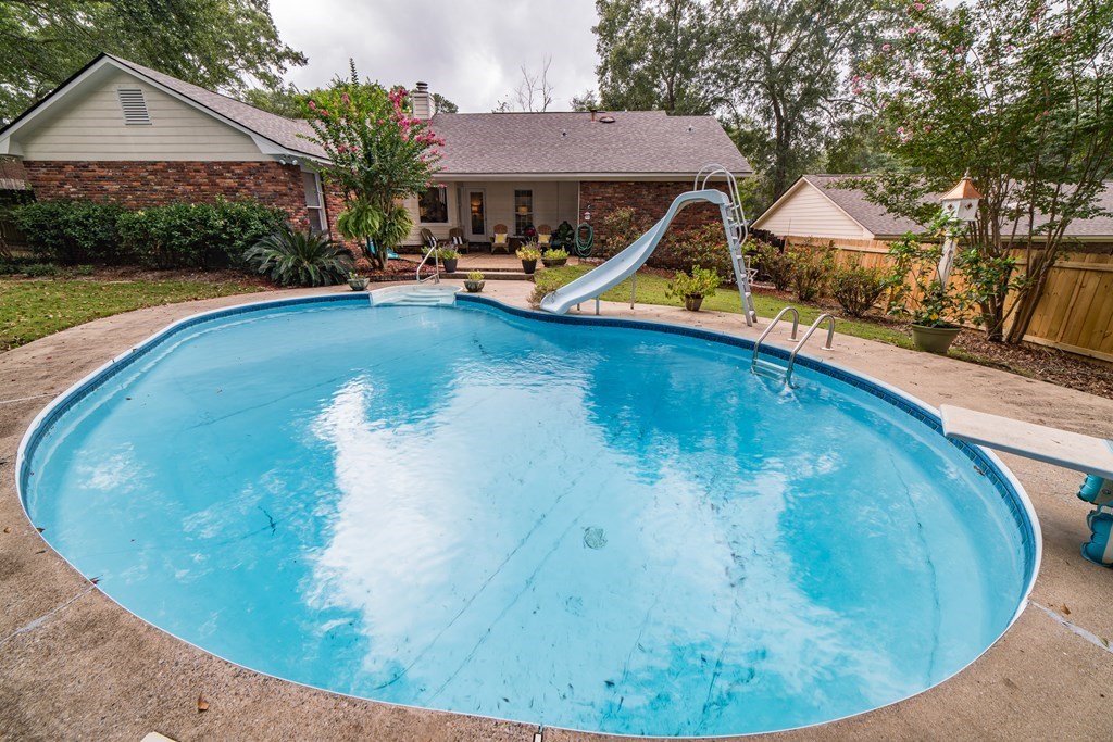 9 Conisburgh Court Columbus, GA 31907 - Photo 6 of 46 a view of a house with swimming pool