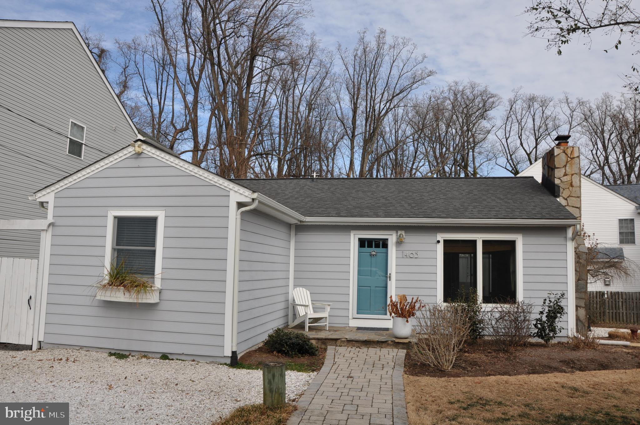 a backyard of a house with seating space