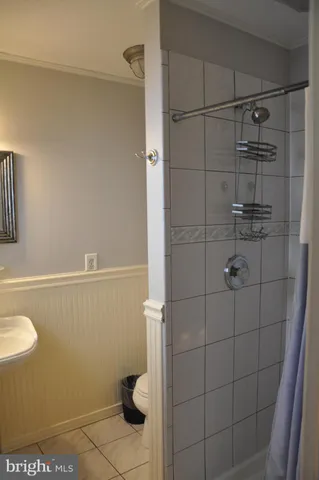 a view of a wooden deck and a yard