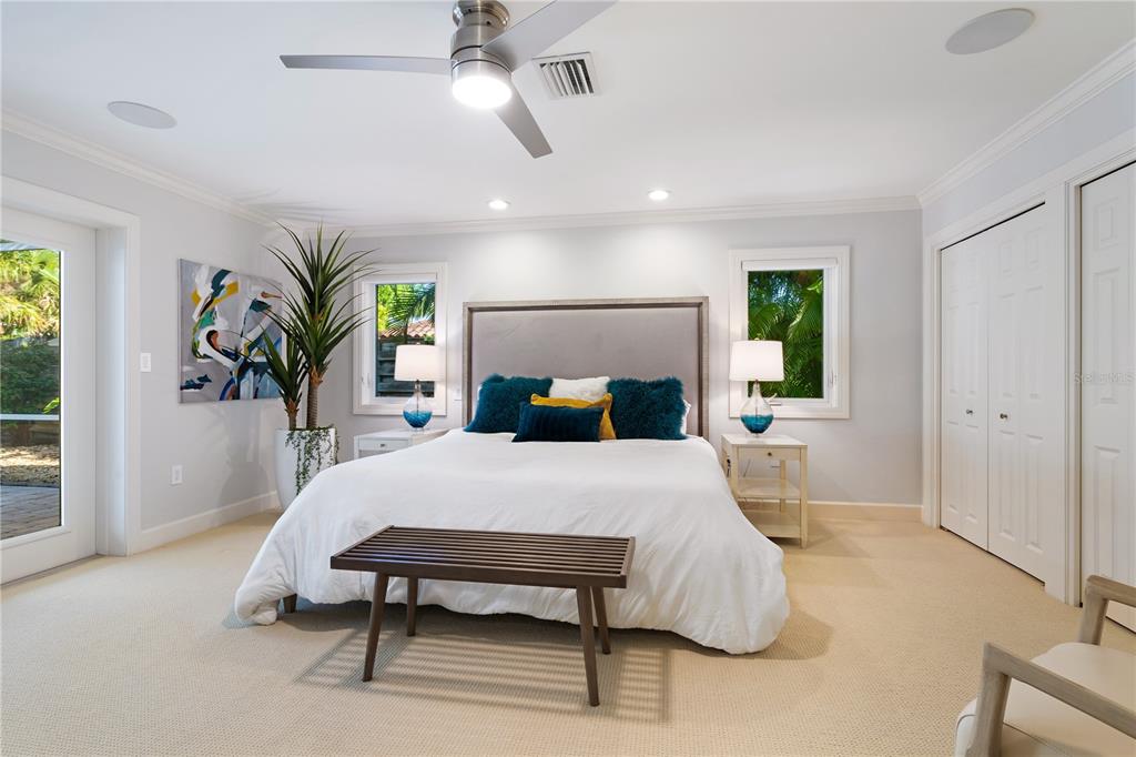 606 Owl Way Sarasota, FL 34236 - Photo 17 of 35 a bedroom with a bed table and window