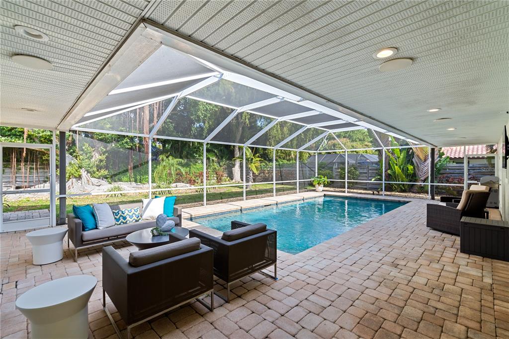 606 Owl Way Sarasota, FL 34236 - Photo 2 of 35 a view of swimming pool with outdoor seating