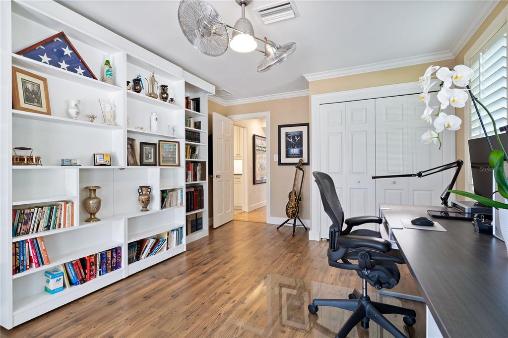 606 Owl Way Sarasota, FL 34236 - Photo 24 of 35 a view of a workspace with furniture and toys