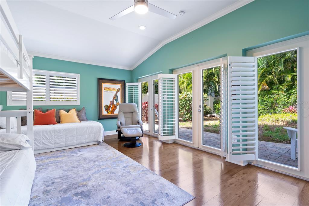 606 Owl Way Sarasota, FL 34236 - Photo 26 of 35 a living room with furniture and large windows