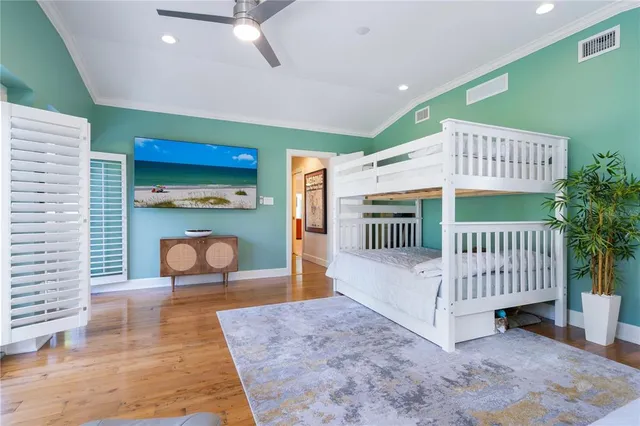 a bathroom with a shower sink and mirror