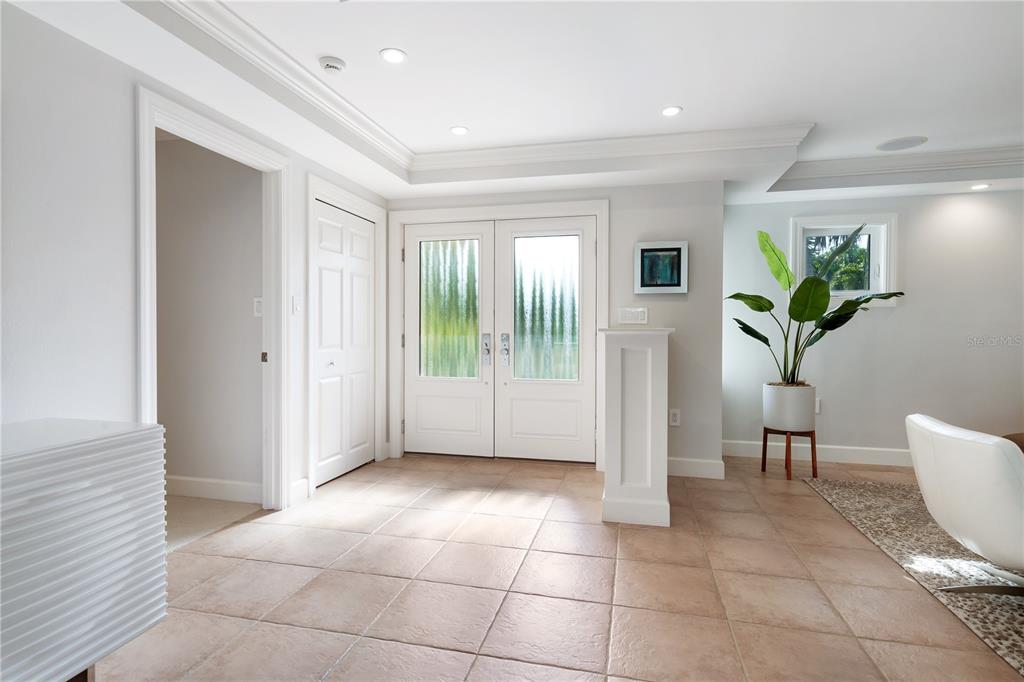 606 Owl Way Sarasota, FL 34236 - Photo 3 of 35 a view of an entryway with wooden floor