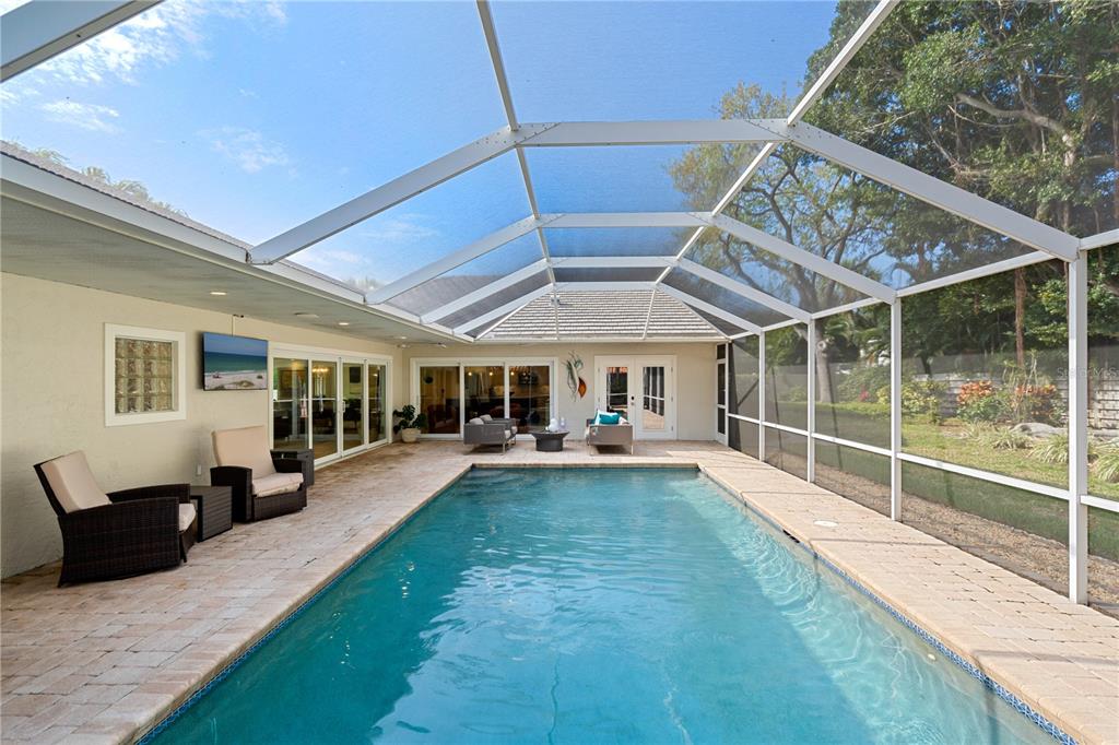 606 Owl Way Sarasota, FL 34236 - Photo 33 of 35 a view of a porch with furniture and a yard