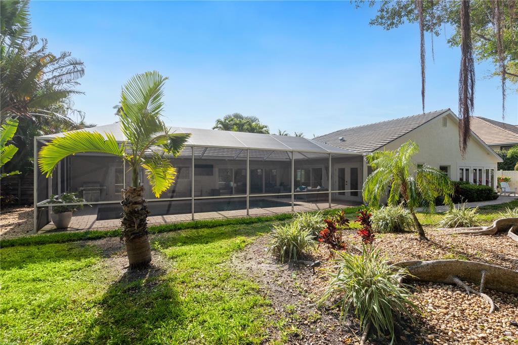 606 Owl Way Sarasota, FL 34236 - Photo 35 of 35 a front view of a house with garden