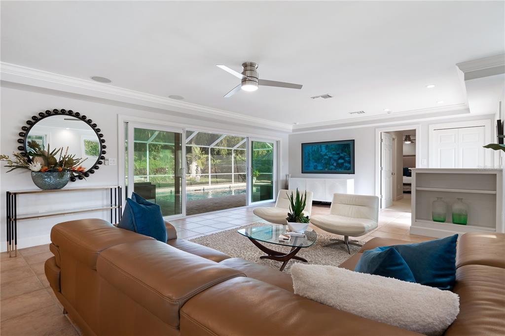 606 Owl Way Sarasota, FL 34236 - Photo 6 of 35 a living room with furniture and a fireplace