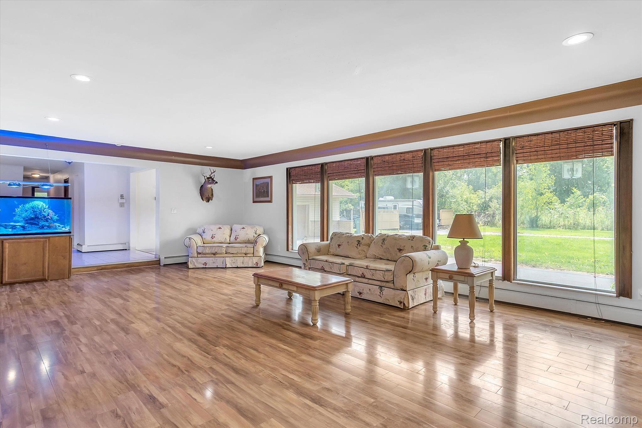 9055 Morton Taylor Road Belleville, MI 48111 - Photo 16 of 55 LIVING ROOM/HARDWOOD FLOORS