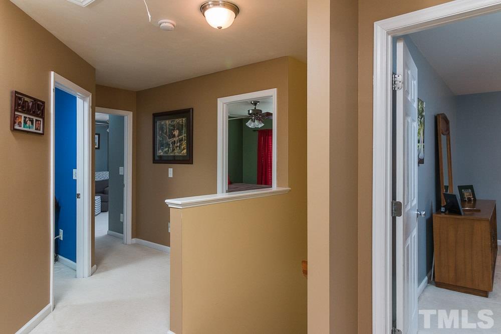 8437 Aztec Dawn Court Raleigh, NC 27613 - Photo 14 of 24 a view of hallway with a elevator