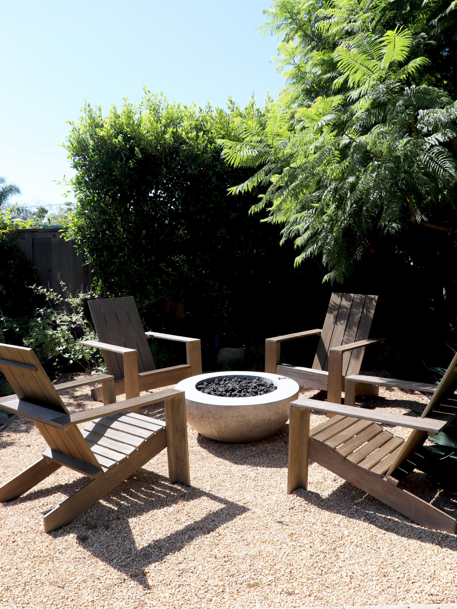 1111 East Ortega Street Santa Barbara, CA 93103 - Photo 4 of 17 a view of a patio with table and chairs and potted plants