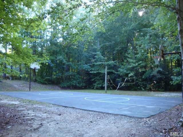 2441 Smokerise Court, Unit 128 Raleigh, NC 27615 - Photo 3 of 3 a view of a backyard with trees