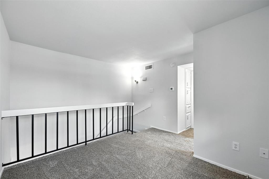 5626 Preston Oaks Road, Unit 22C Dallas, TX 75254 - Photo 20 of 29 a view of a hallway