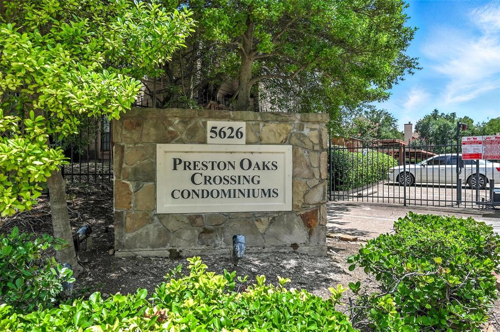 5626 Preston Oaks Road, Unit 22C Dallas, TX 75254 - Photo 29 of 29 a sign on the side of the road