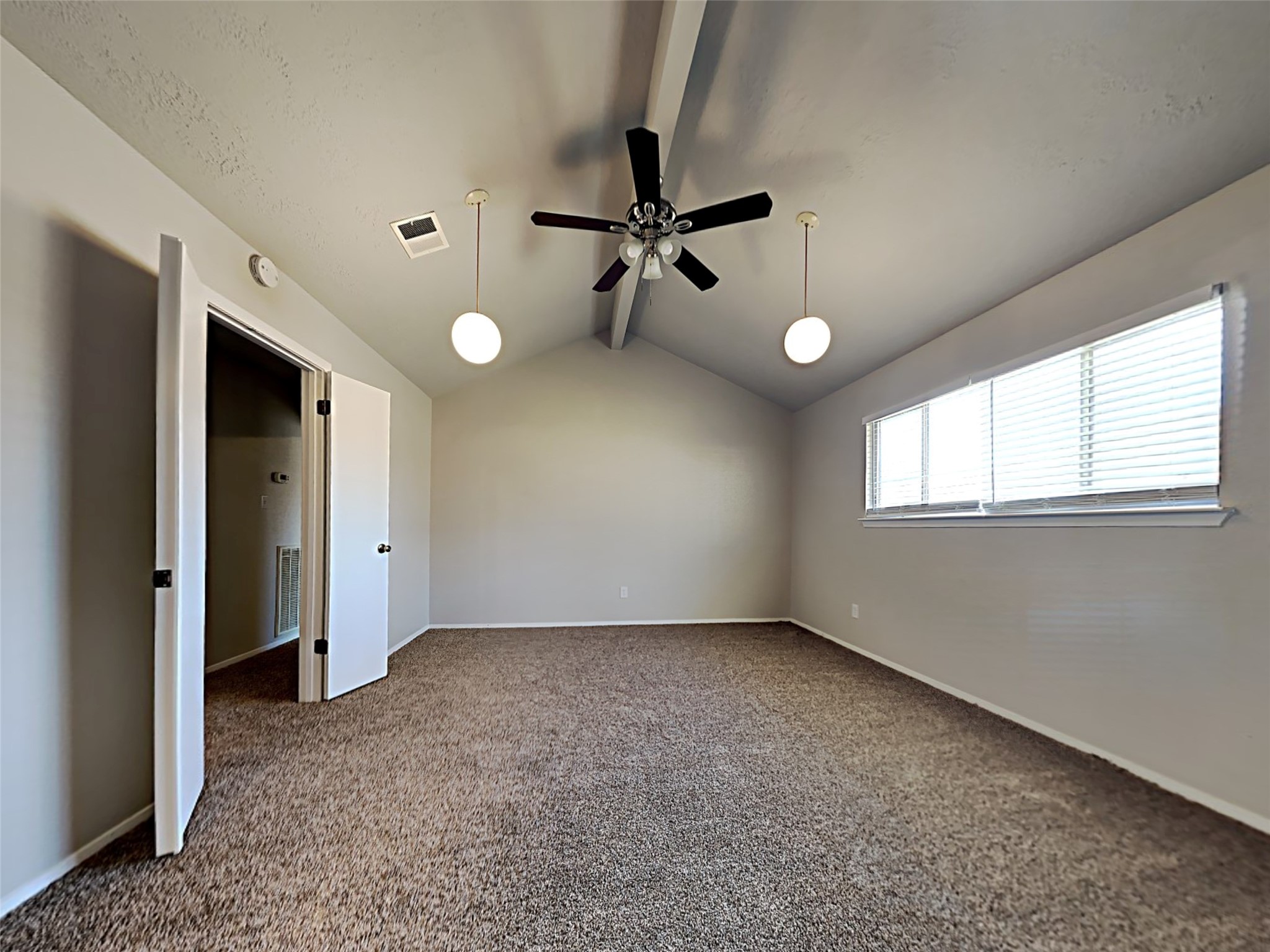 14919 Wainsfield Lane Channelview, TX 77530 - Photo 14 of 17 wooden floor in an empty room with a window