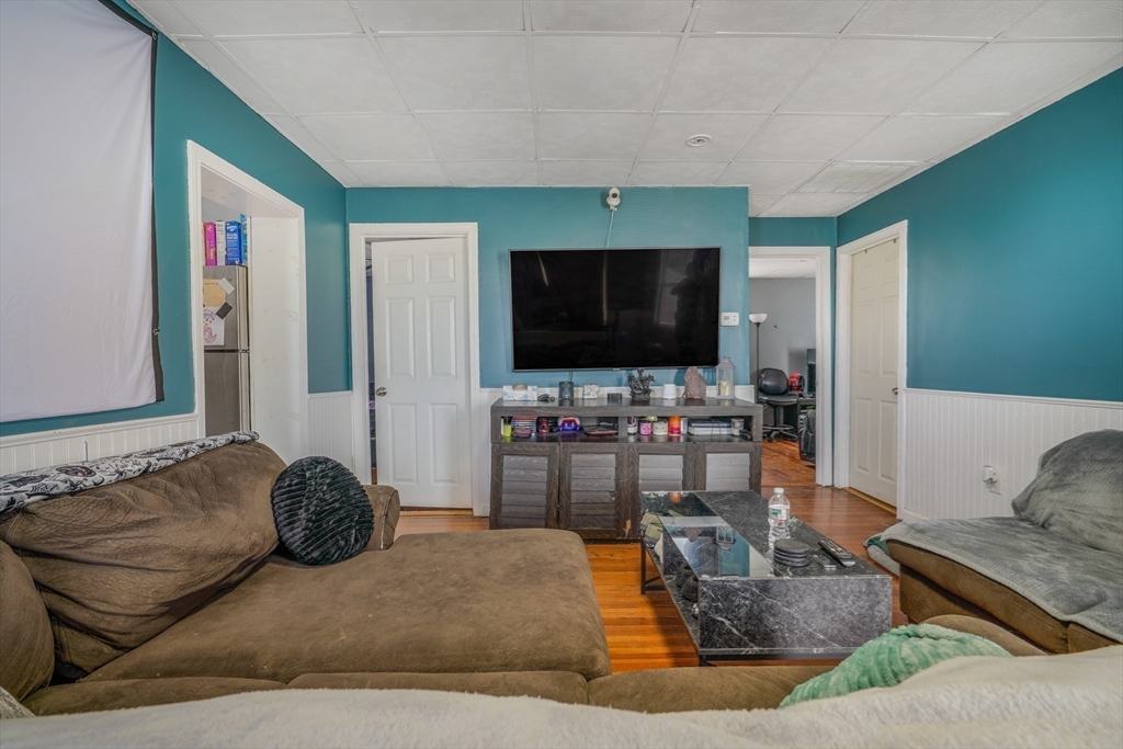 500 Birch Street Fall River, MA 02724 - Photo 11 of 35 a living room with furniture and a flat screen tv