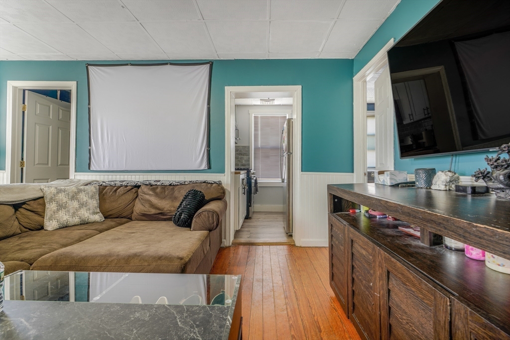 500 Birch Street Fall River, MA 02724 - Photo 12 of 35 a living room with furniture and a flat screen tv