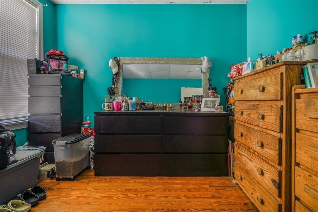 500 Birch Street Fall River, MA 02724 - Photo 16 of 35 a room with storage cabinets and a table