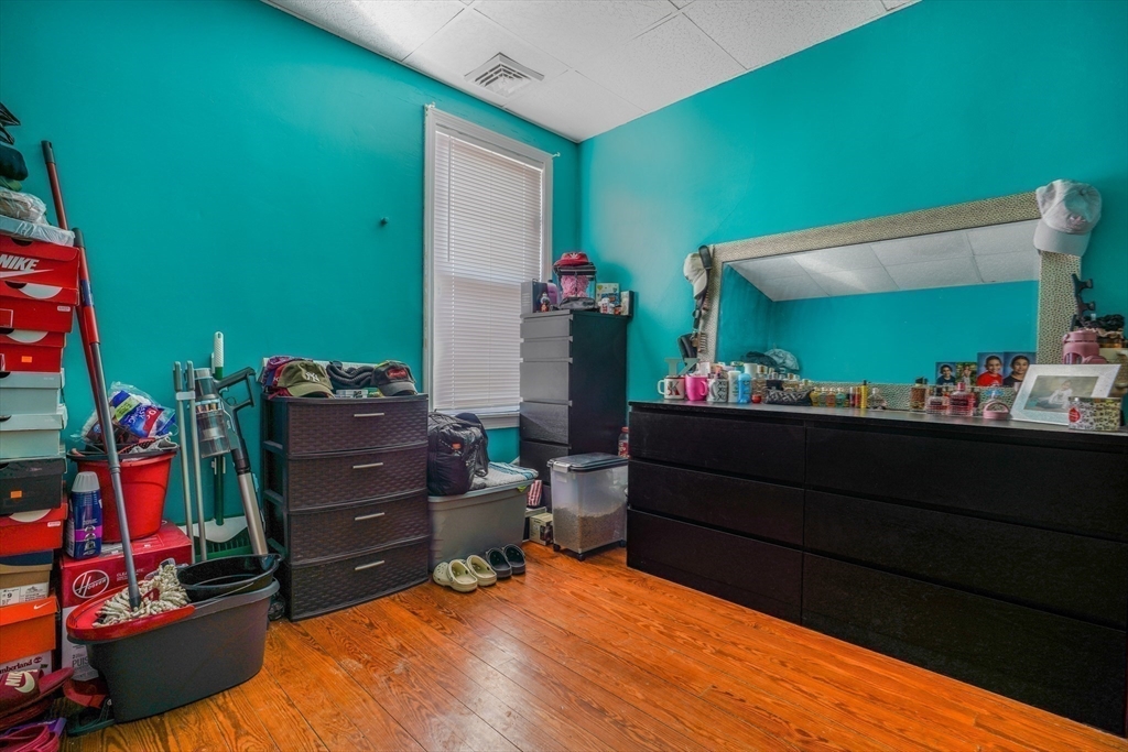 500 Birch Street Fall River, MA 02724 - Photo 17 of 35 a room with lots of books and furniture