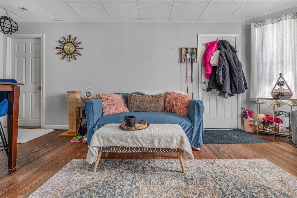 500 Birch Street Fall River, MA 02724 - Photo 25 of 35 a living room with furniture and a wooden floor