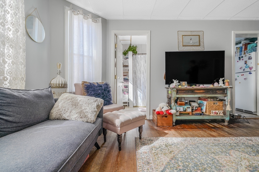 500 Birch Street Fall River, MA 02724 - Photo 28 of 35 a living room with furniture and a flat screen tv