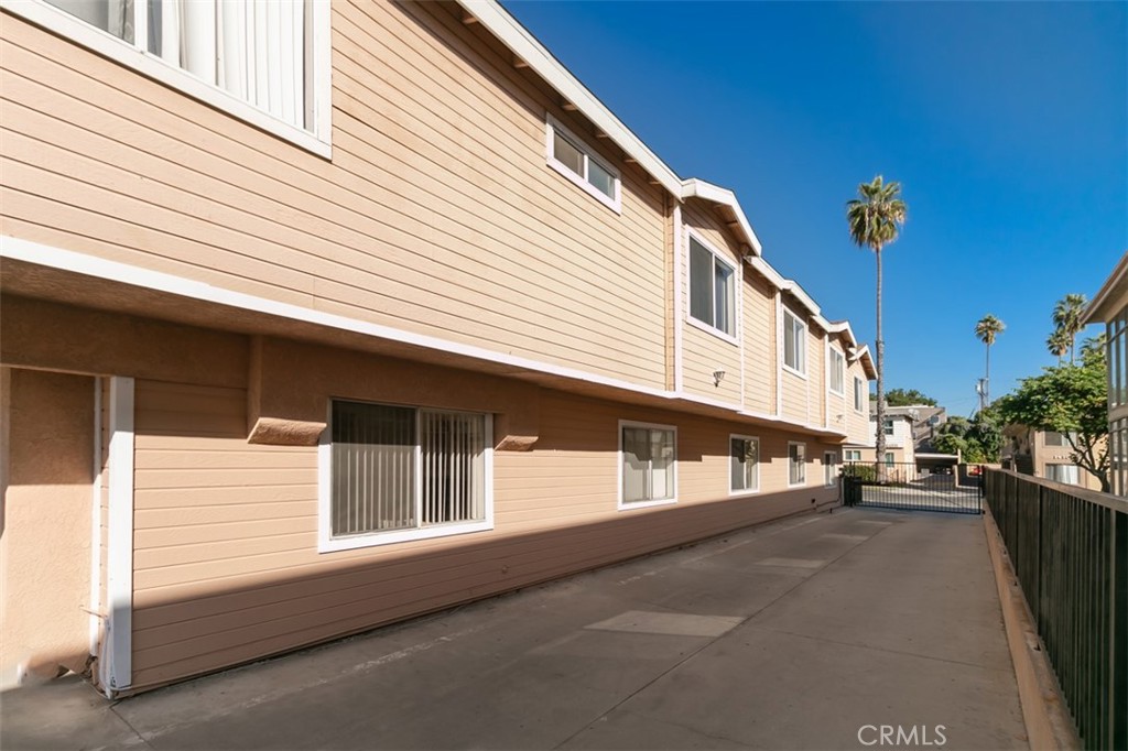 14112 Delano Street Van Nuys, CA 91401 - Photo 3 of 27 Driveway to rear parking