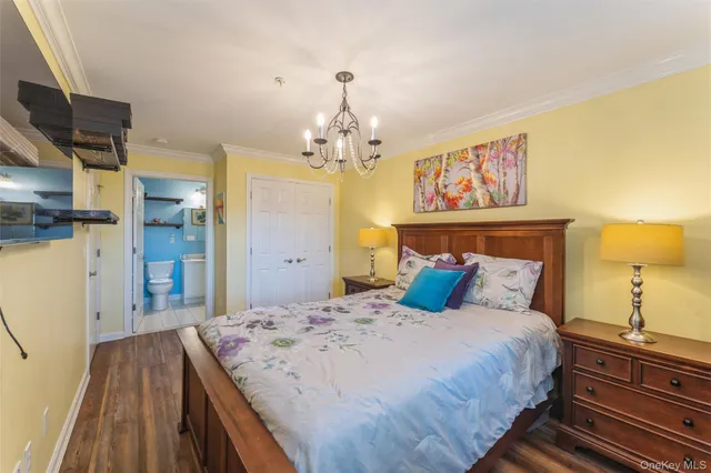 a kitchen with stainless steel appliances a stove microwave and sink