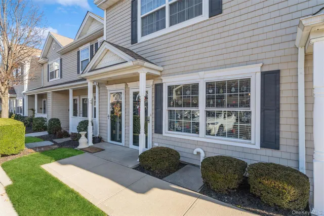 a view of a building with a yard