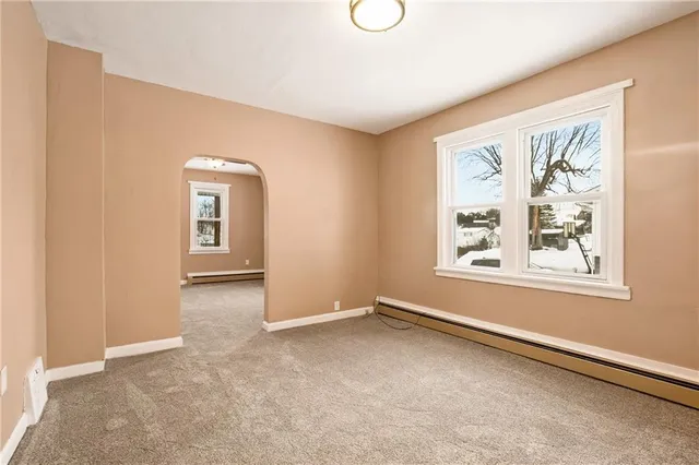 an empty room with windows