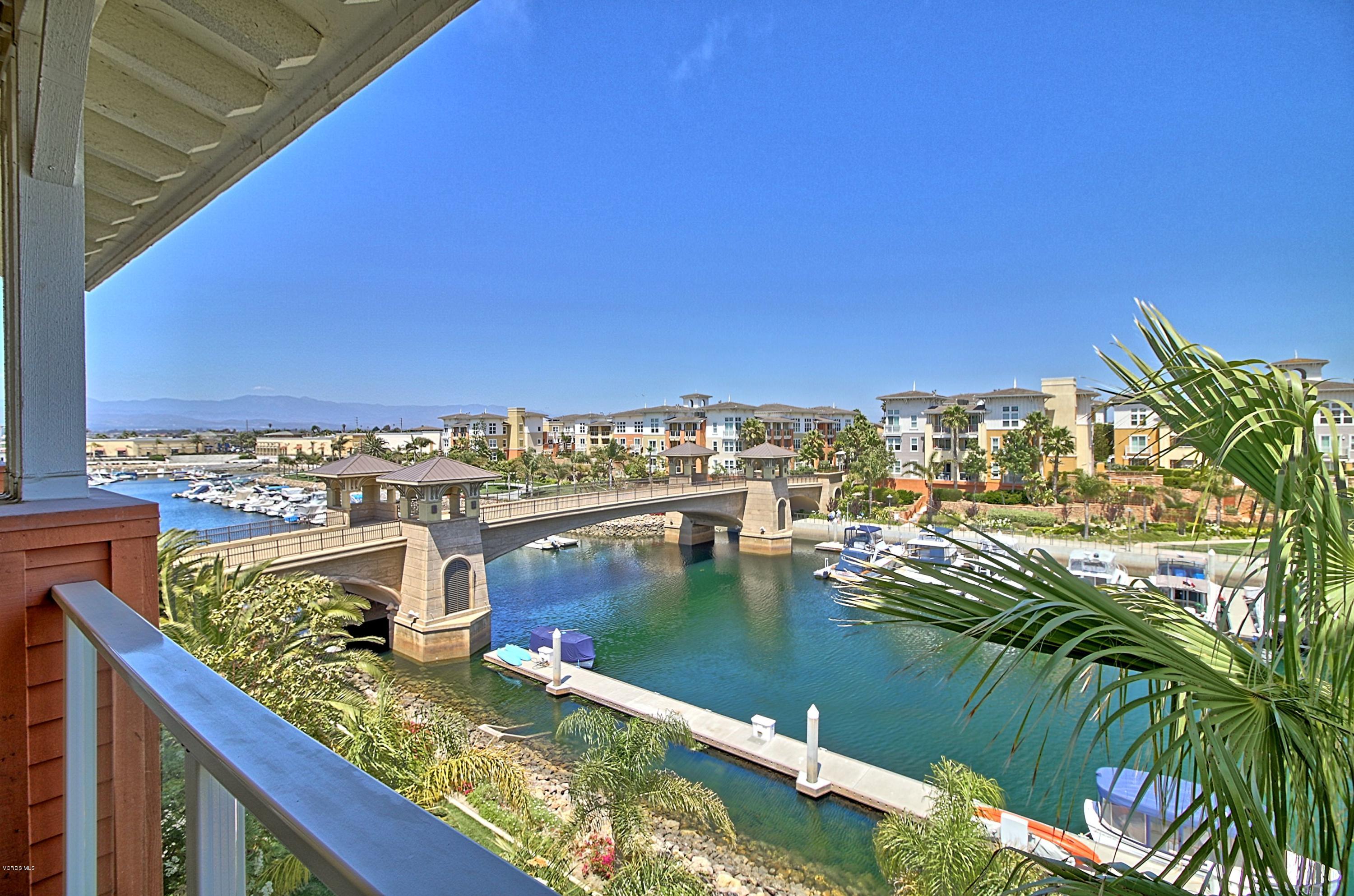 1568 Seabridge Lane Oxnard, CA 93035 - Photo 1 of 33 a view of swimming pool with outdoor seating and yard in the back