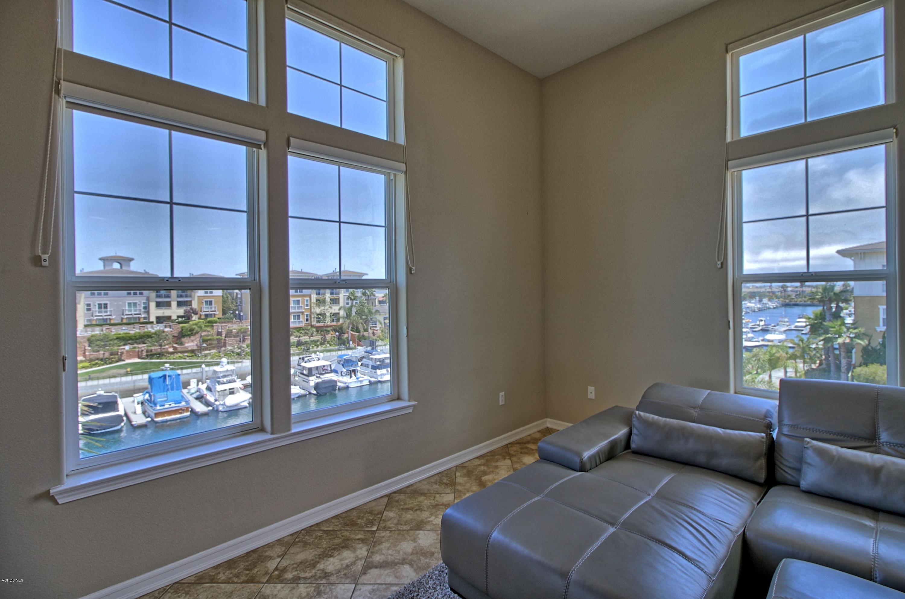 1568 Seabridge Lane Oxnard, CA 93035 - Photo 11 of 33 a living room with furniture and a window