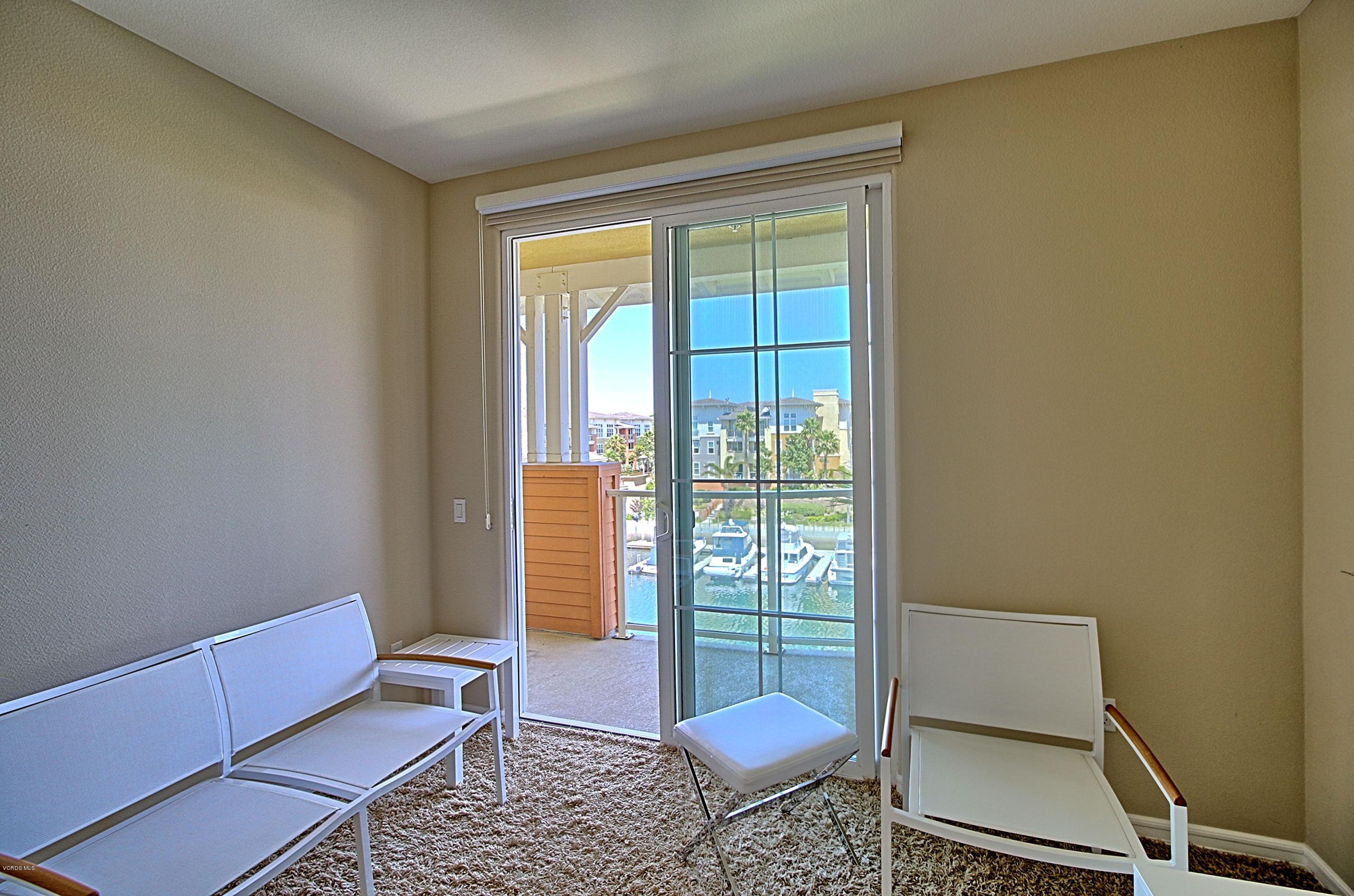 1568 Seabridge Lane Oxnard, CA 93035 - Photo 20 of 33 a living room with furniture and a window