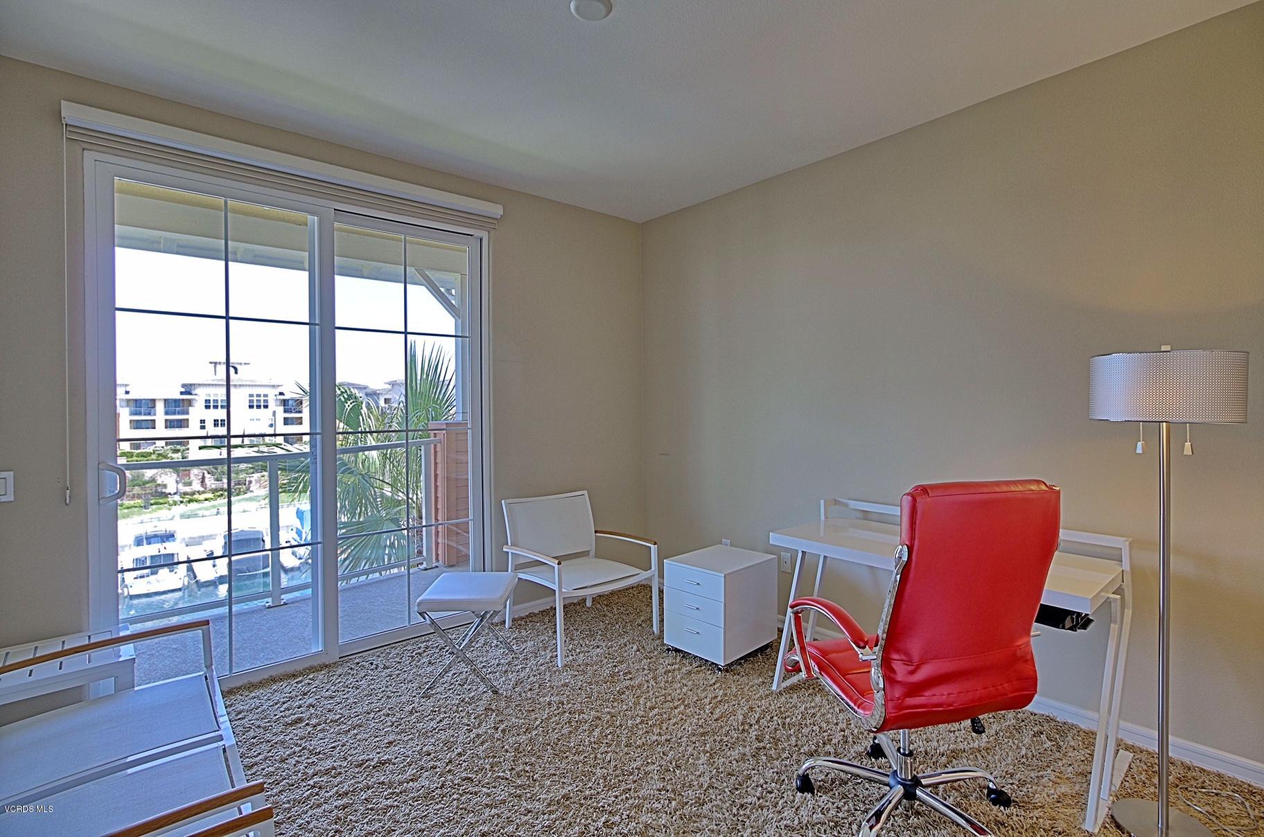 1568 Seabridge Lane Oxnard, CA 93035 - Photo 21 of 33 a living room with furniture and a window