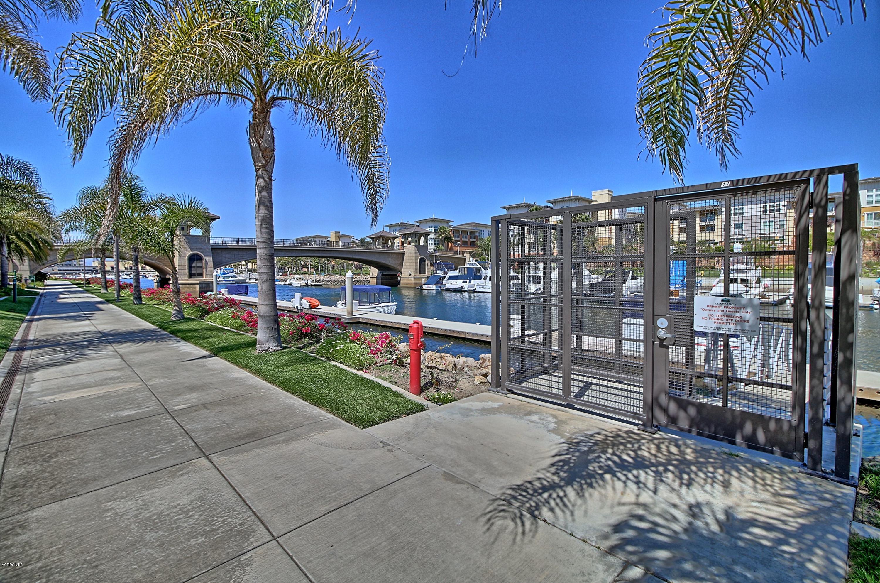 1568 Seabridge Lane Oxnard, CA 93035 - Photo 31 of 33 a view of a park with swings and slides