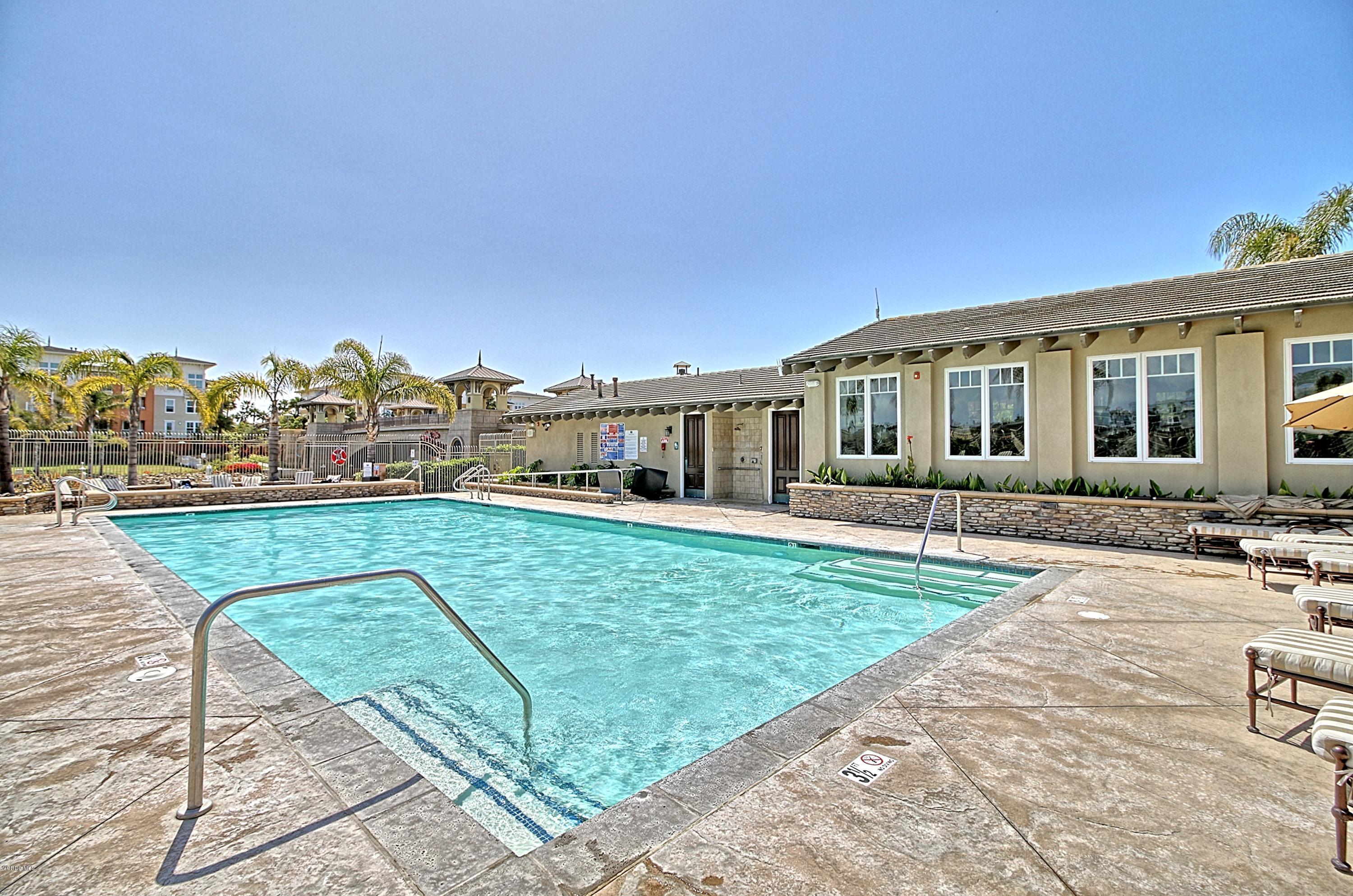 1568 Seabridge Lane Oxnard, CA 93035 - Photo 33 of 33 a front view of a house with a yard