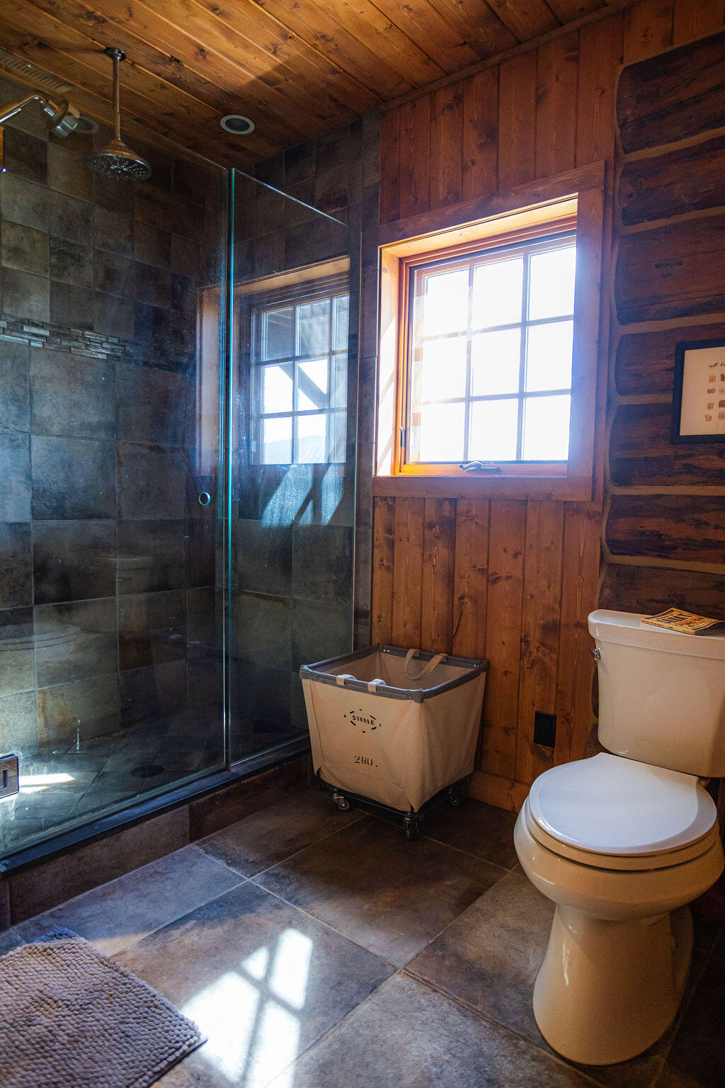 2335 County Road Placerville, CO 81430 - Photo 12 of 38 a bathroom with a toilet sink and shower