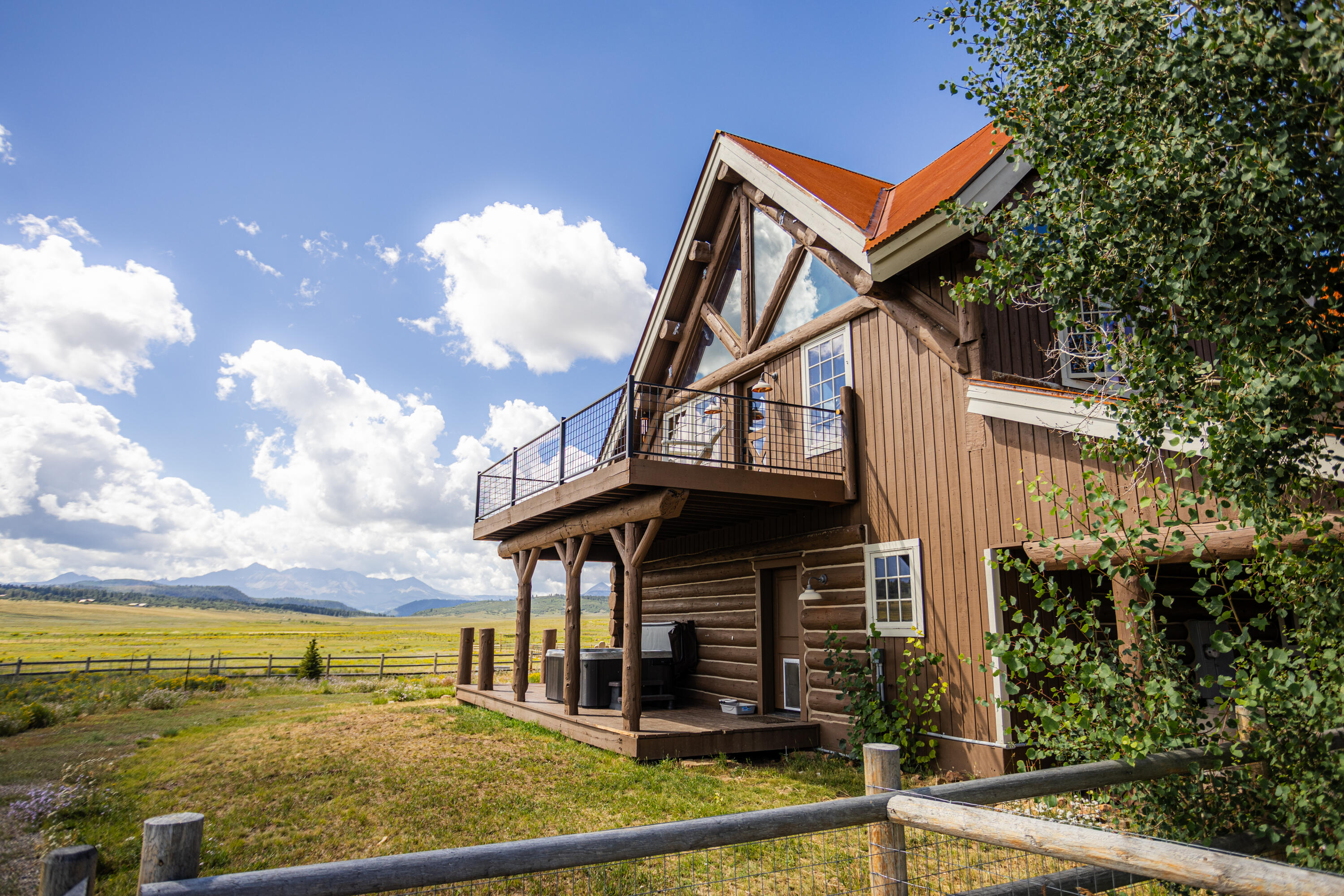 2335 County Road Placerville, CO 81430 - Photo 37 of 38 a view of a house with a ocean view