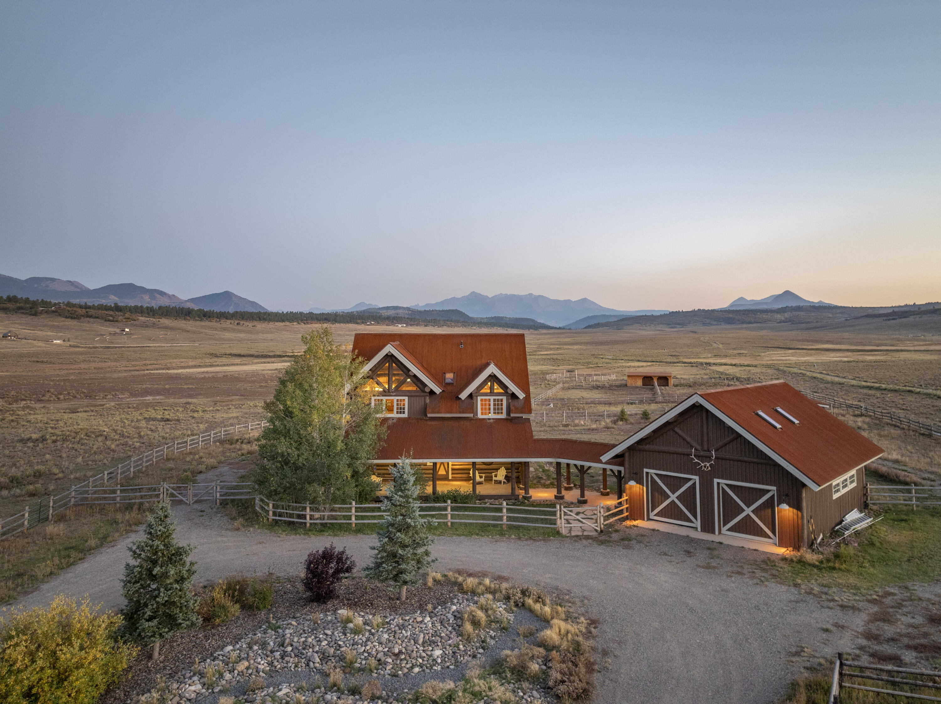 2335 County Road Placerville, CO 81430 - Photo 38 of 38 a view of a ocean with a mountain in the background