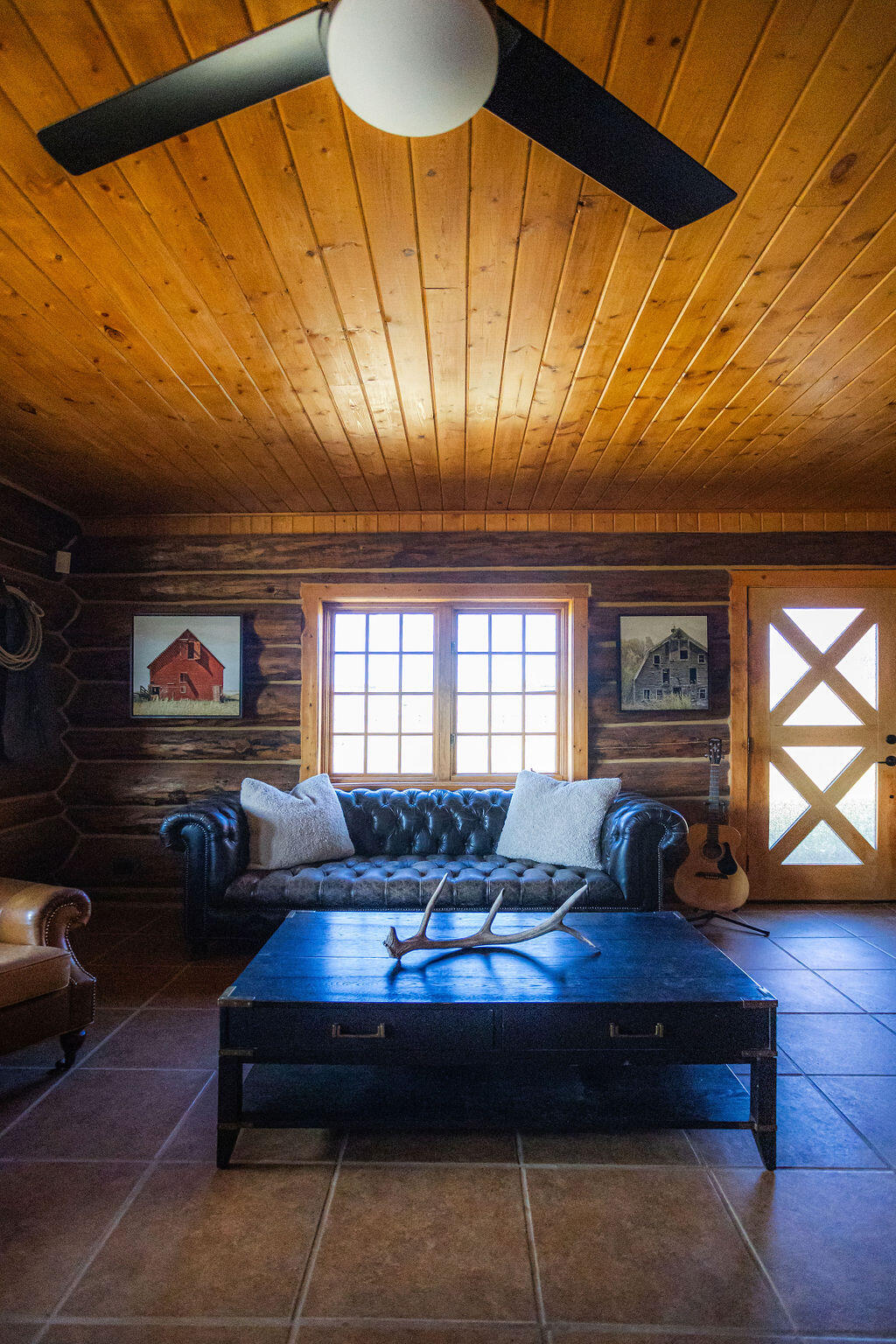 2335 County Road Placerville, CO 81430 - Photo 6 of 38 a living room with furniture and a flat screen tv